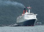 The Queen Elizabeth II came to Pago Pago in early 2004. This ship was HUGE!